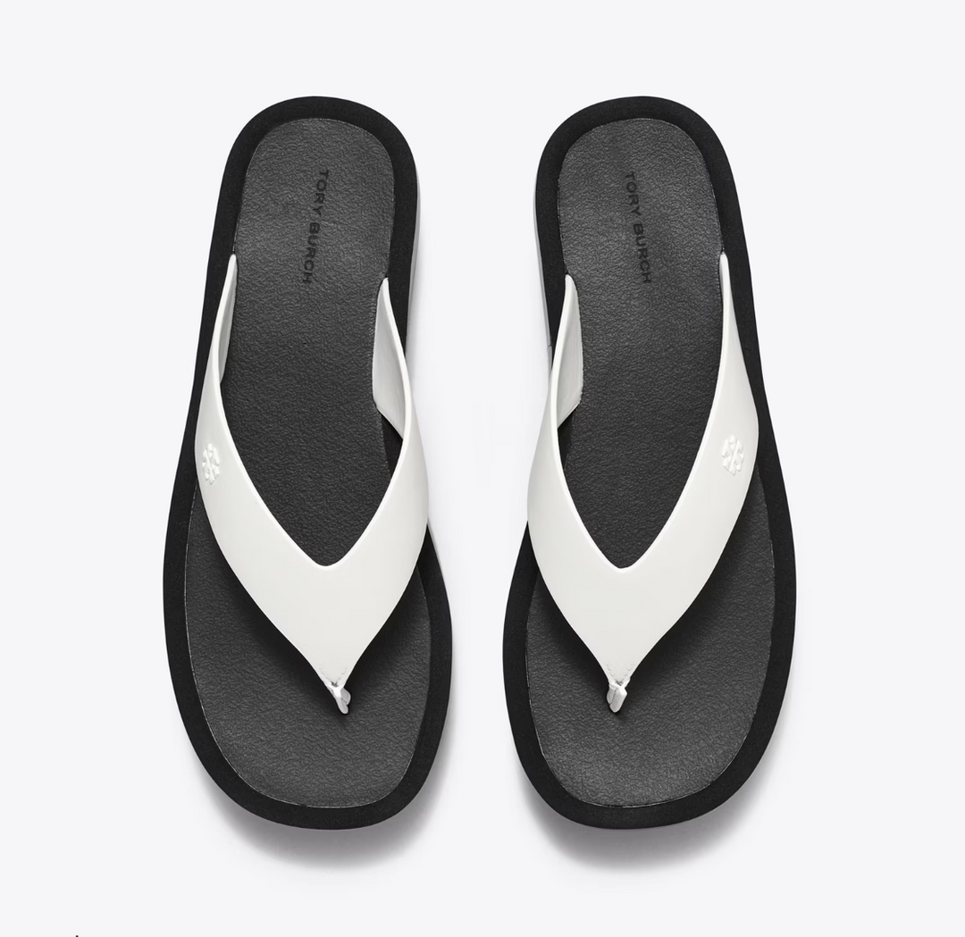 White and black shops flip flops