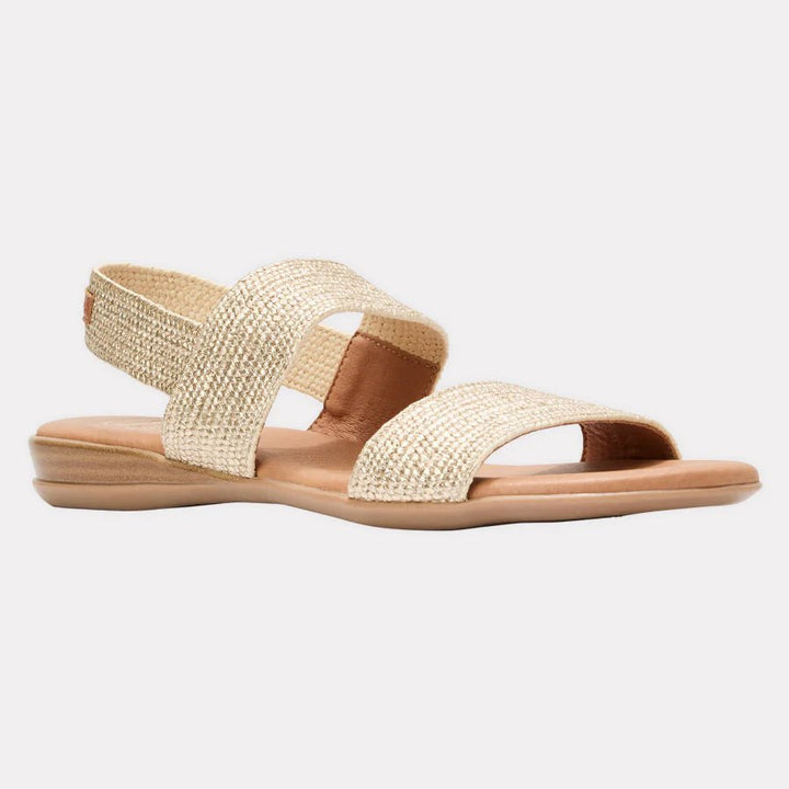 Andre Assous NIGELLA PLATINO WOVEN RAFFIA SANDAL Shoes | Shop now at Main &amp; Taylor Shoes!