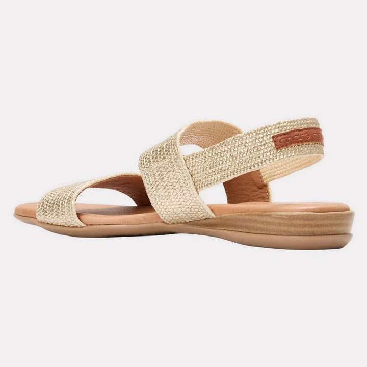 Andre Assous NIGELLA PLATINO WOVEN RAFFIA SANDAL Shoes | Shop now at Main &amp; Taylor Shoes!