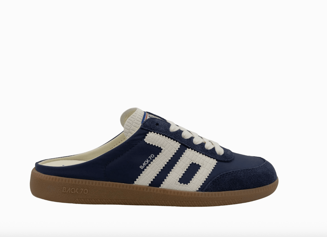 Back 70 EASTER NAVY BACKLESS SNEAKER Shoes | Shop now at Main &amp; Taylor Shoes!