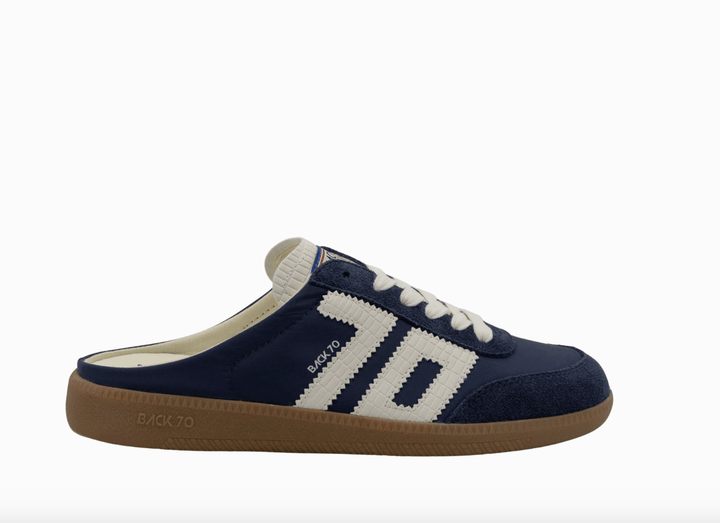 Back 70 EASTER NAVY BACKLESS SNEAKER Shoes | Shop now at Main &amp; Taylor Shoes!