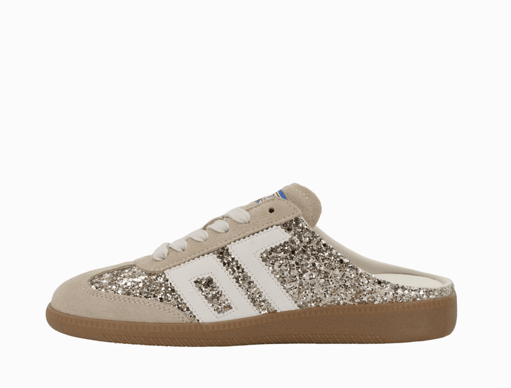 Back 70 EASTER GLITTER GOLD BACKLESS SNEAKER Shoes | Shop now at Main &amp; Taylor Shoes!