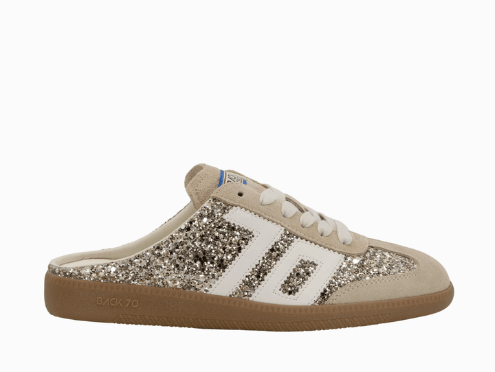 Back 70 EASTER GLITTER GOLD BACKLESS SNEAKER Shoes | Shop now at Main &amp; Taylor Shoes!