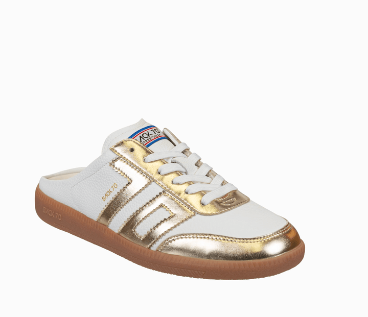 Back 70 EASTER METALLIC GOLD BACKLESS SNEAKER Shoes | Shop now at Main &amp; Taylor Shoes!