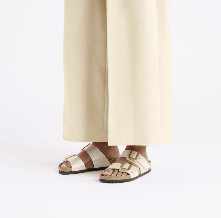 BIRKENSTOCK SYDNEY LUX BUCKLE PEARL WHITE SANDAL SHOES | Shop now at Main &amp; Taylor Shoes!