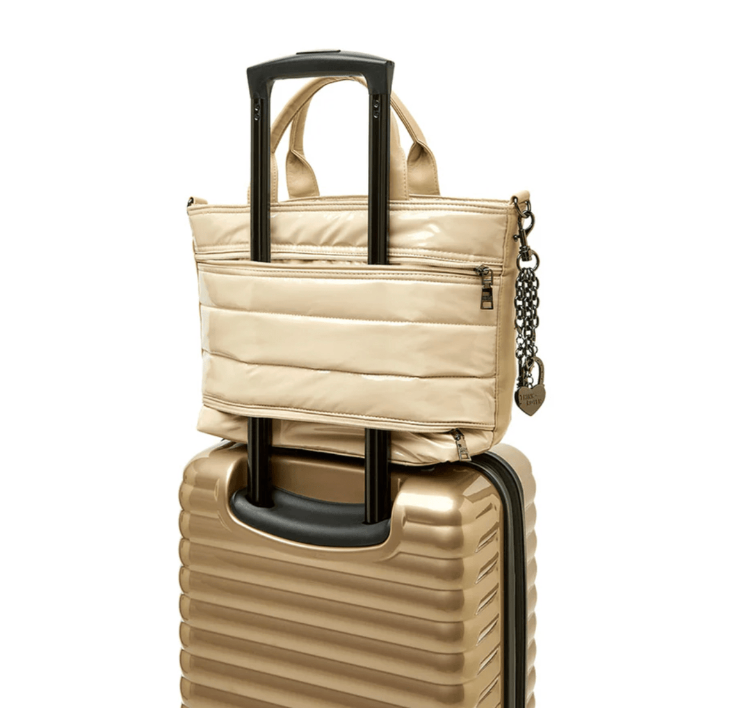 Think Roylin GETAWAY BLONDE PATENT TOTE Handbags | Shop now at Main &amp; Taylor Shoes!