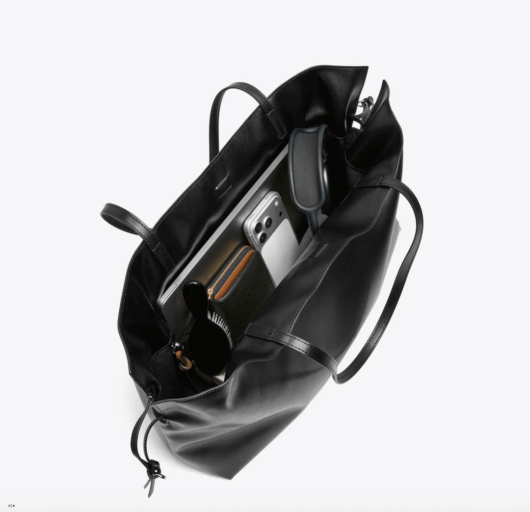 Tory Burch Handbag ELLA RECYCLED DRAWSTRING LARGE TOTE BLACK Handbags | Shop now at Main &amp; Taylor Shoes!