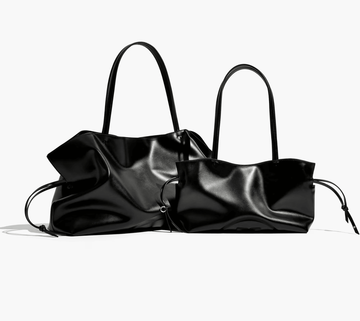 Tory Burch Handbag ELLA RECYCLED DRAWSTRING TOTE SMALL BLACK Handbags | Shop now at Main &amp; Taylor Shoes!