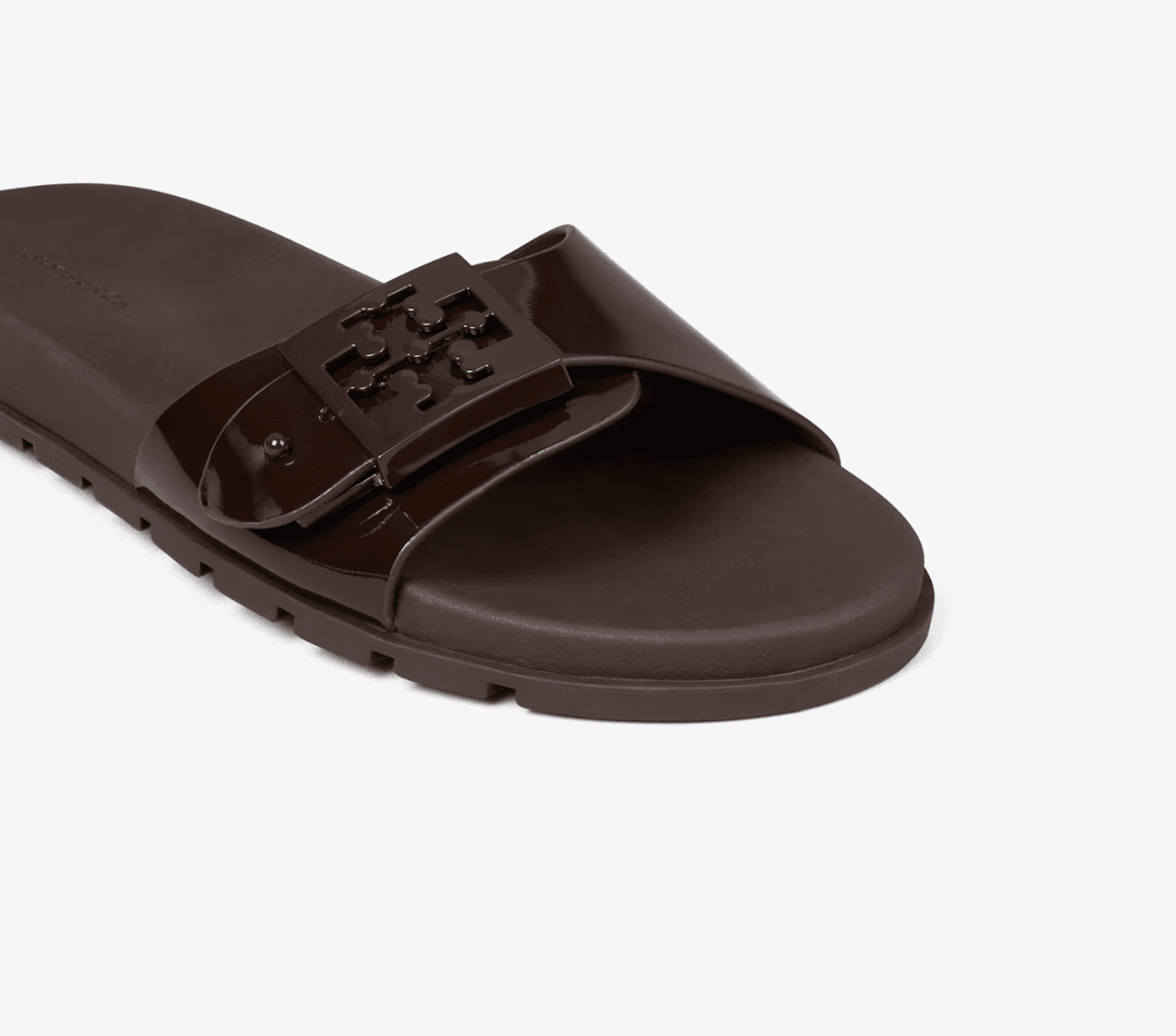TORY BURCH MELLOW BUCKLE SLIDE DARK COCOA SHOES | Shop now at Main &amp; Taylor Shoes!