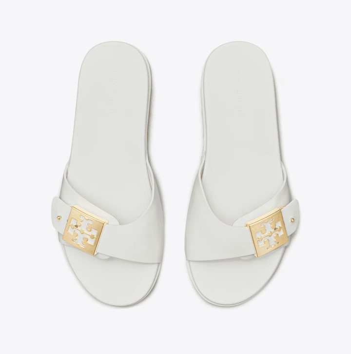 TORY BURCH MELLOW BUCKLE WHITE GOLD SLIDE SHOES | Shop now at Main &amp; Taylor Shoes!